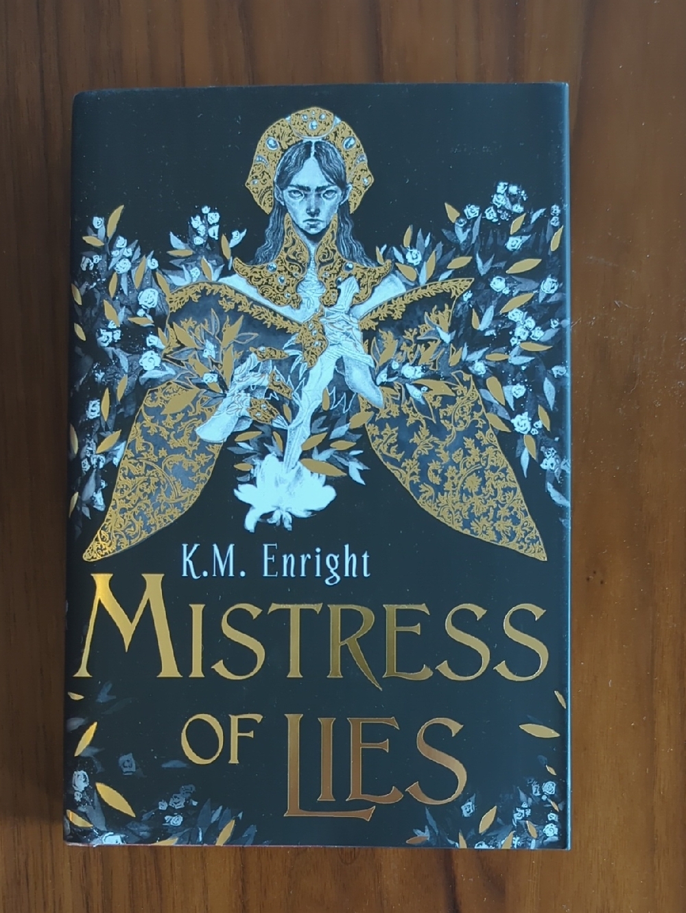 Mistress of Lies by K.M. Enright - Illumicrate Hardcover
